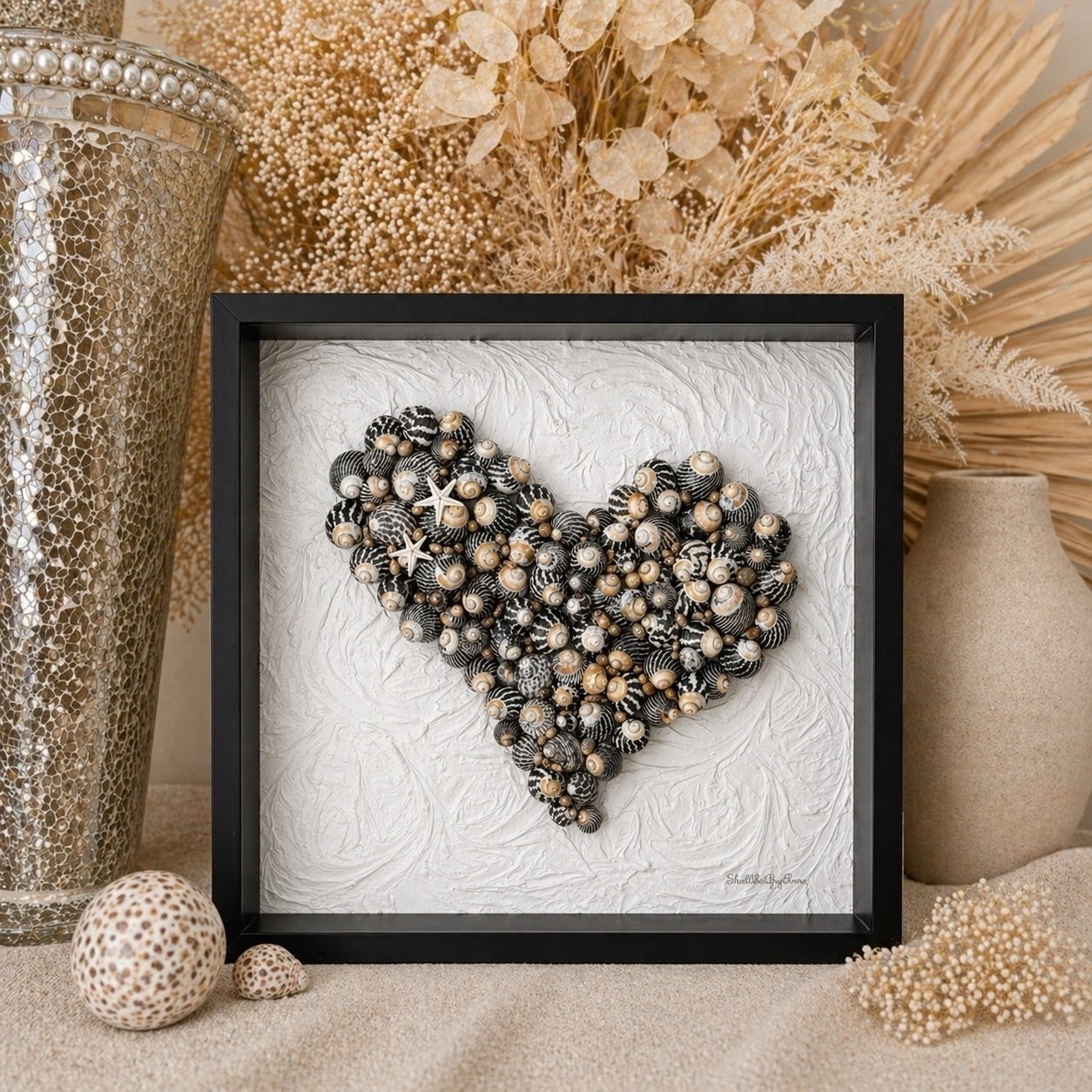 Black and white love heart handmade from shells modern coastal wall art decor. 