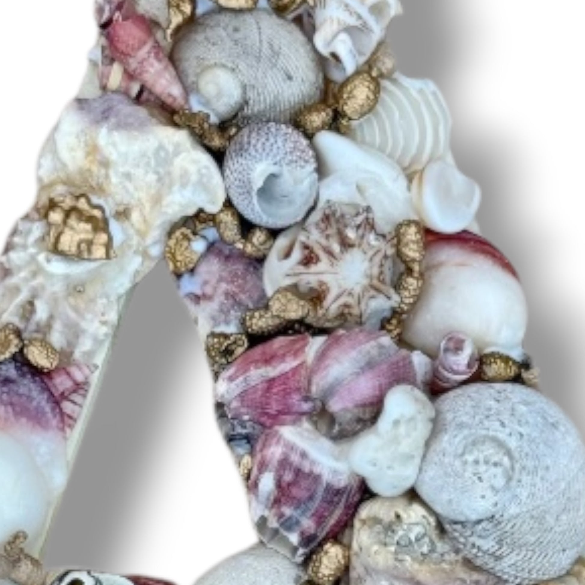 Detailed view of handmade shell art initial created with gold coated sea beads and pink white natural seashells, coastal elegant decor. Available in all letters and made to order.