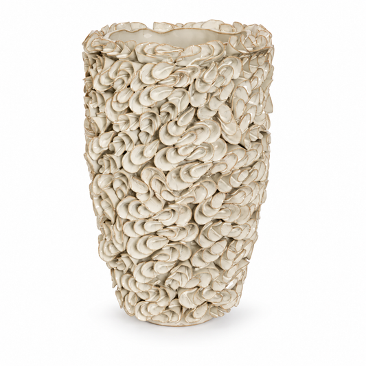 Tidal sculptural stoneware vase in grey on a white backdrop, full vase visible