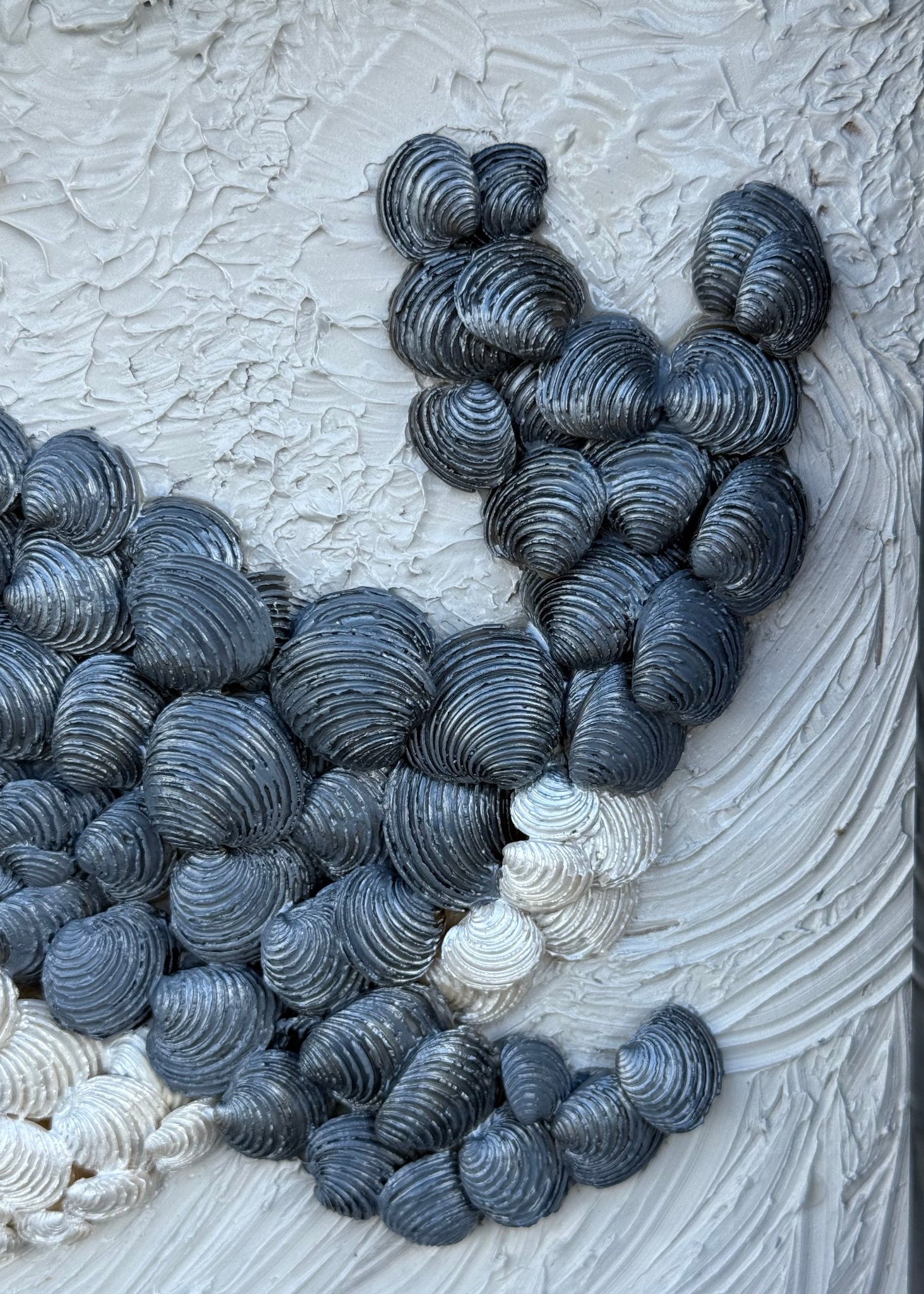 Close up of the whale tail wall art, black white grey with golden spout shells, framed seashell gift keepsake 