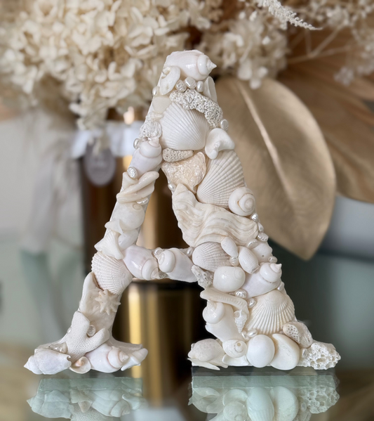 Handmade shell art initial - Soft, light and timeless with natural creamy white seashells. An unframed personalised coastal keepsake ideal for a new baby nursery or bedroom decor and door sign. Available in all letters and made to order.